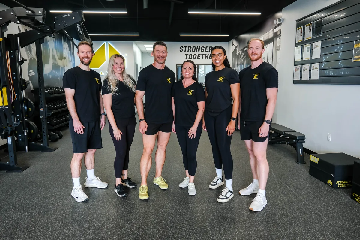The Alloy Personal Training Colorado Springs team in the studio: Carter Goodson, Brea Burger, Logan Brodine, Bostyn Brodine, Adila Gathers and Sean Riden